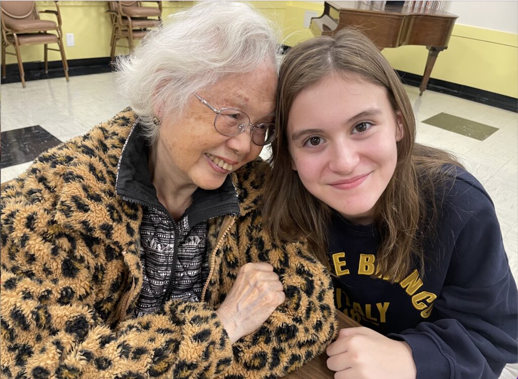 Image of an older woman and a girl